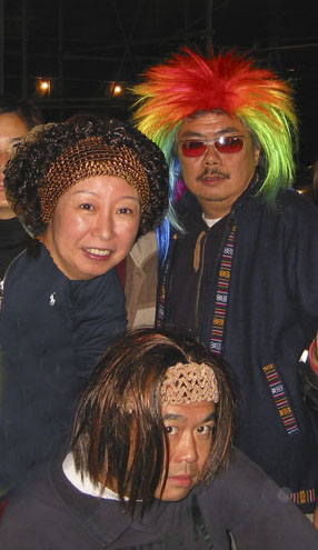 On New Year's Eve 2002, Steve & Emily and hubby Stephen in punky wig