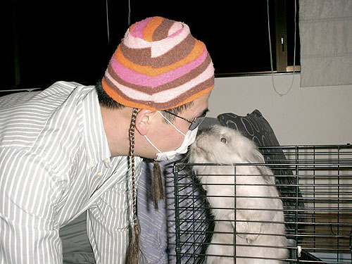 Biggie kisses Stephen - during SARS time May 2003.  Stephen has a very strange hairstyle.